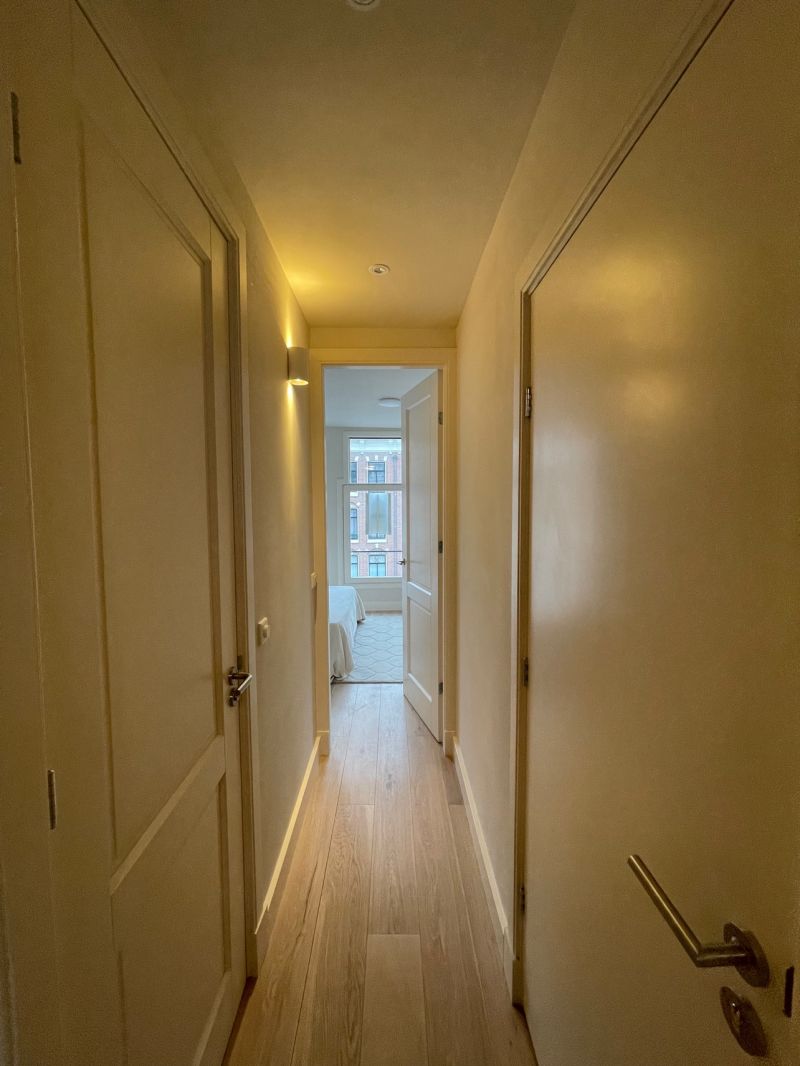 New hallway with recessed lighting